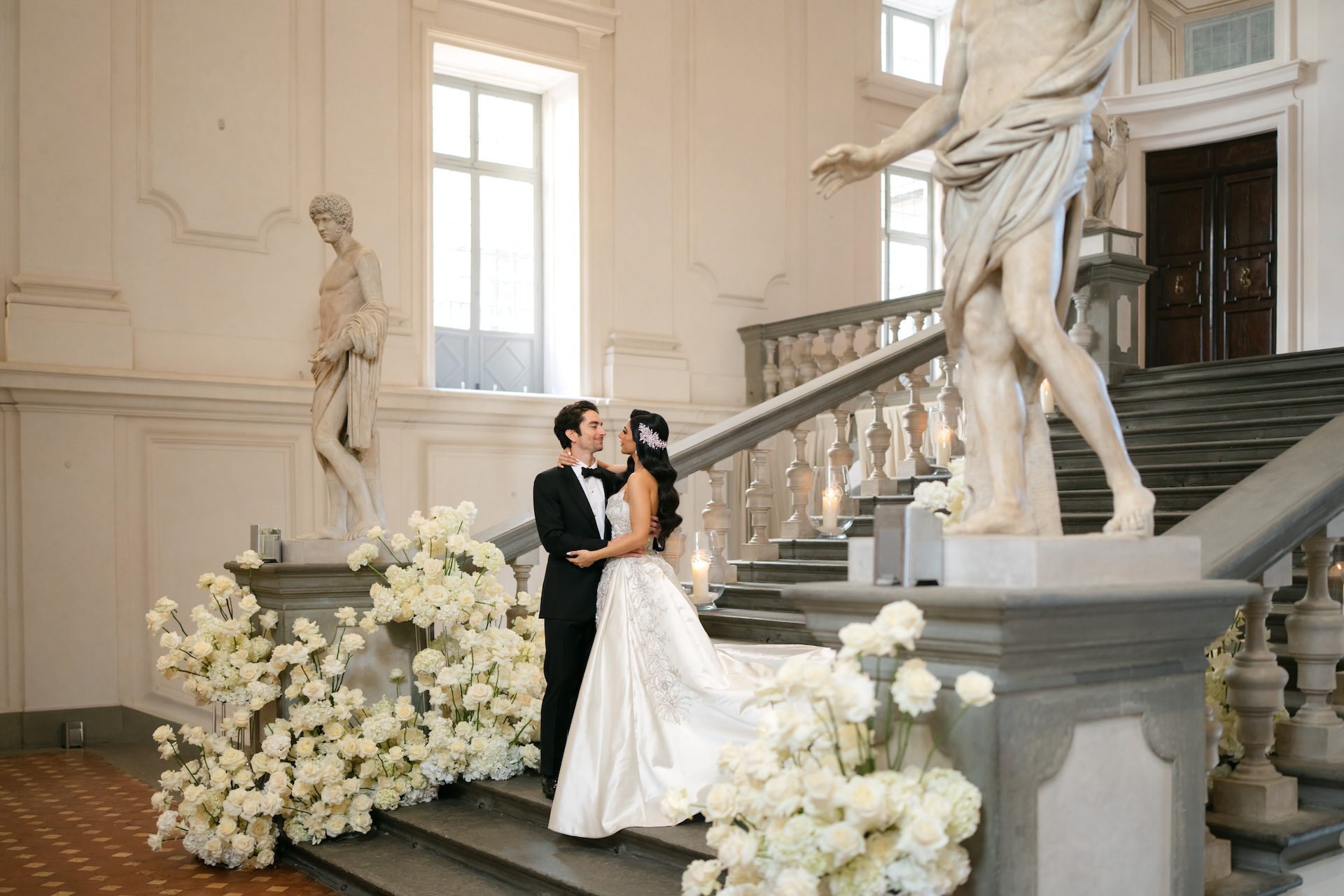 The bride and groom on the ladder of a Florentine palace